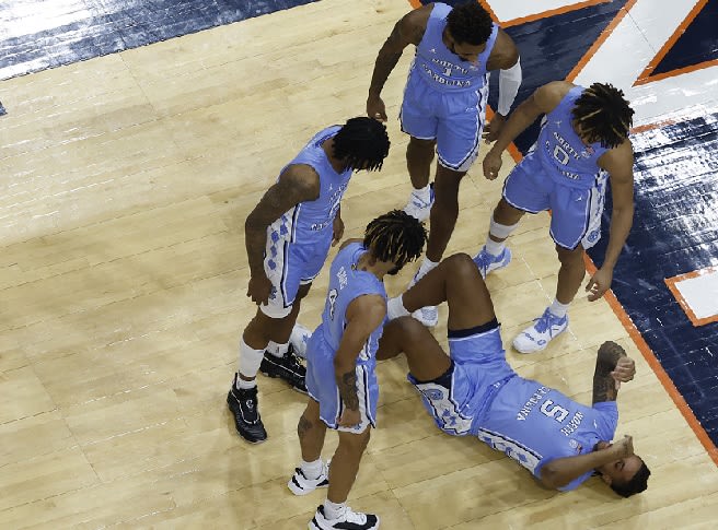 UNC forward Armando Bacot injured an ankle 78 seconds into Tuesday's loss at Virginia and did not return.