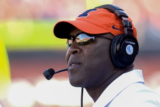 Illinois Fighting Illini head coach Lovie Smith observes his team in action against the Purdue Boilermakers