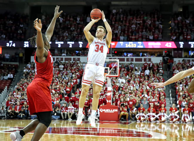 Brad Davison squares up for a 3-point shot, The junior hit a four of Wisconsin's program-record 18 3-pointers.