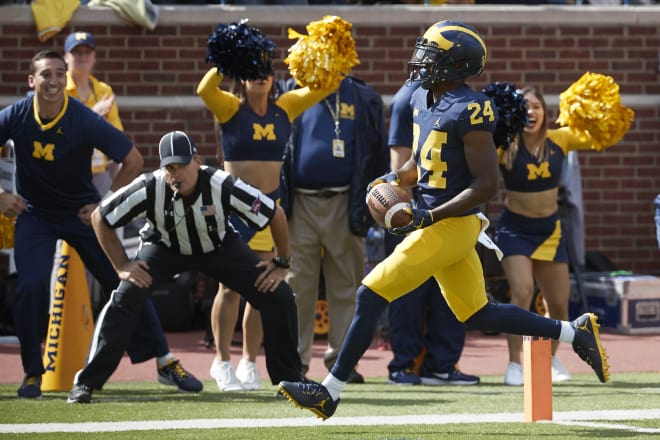 Sophomore cornerback Lavert Hill cashes in a second of two pick-sixes that helped Michigan win.