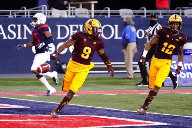 DJ Taylor at the end of his 100-yard kickoff return for touchdown against Arizona (AP Photo/Rick Scuteri)