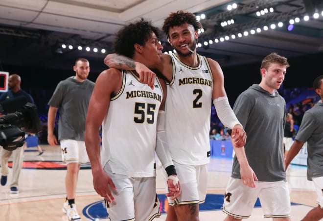 Michigan Wolverines basketball's Eli Brooks (left) and Isaiah Livers.