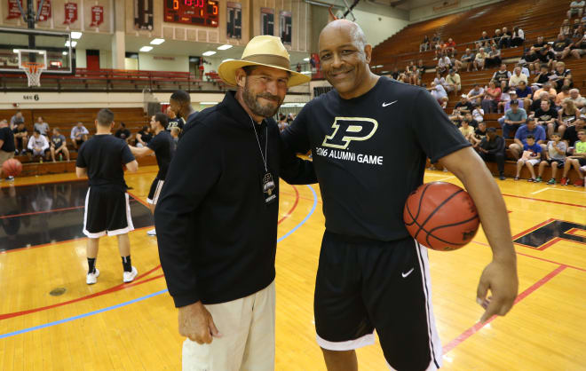 Larry Clisby pictured here with Todd Mitchell, was at his happiest when he was around Purdue basketball.