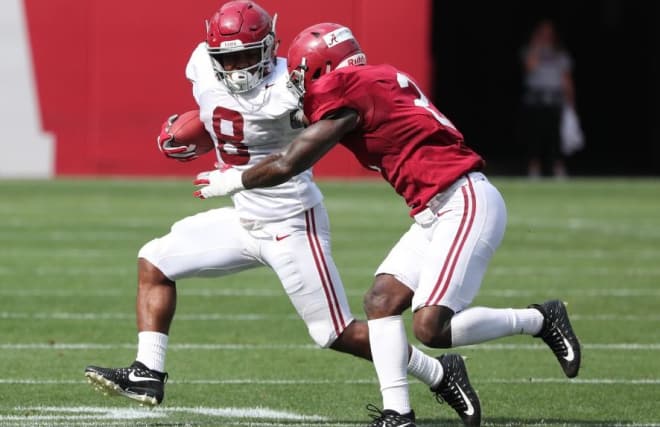 Josh Jacobs runs past a defender during Friday's scrimmage | Photo by Alabama Athletics 