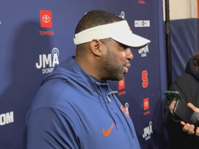 Mar 23, 2024; Syracuse, New York, USA; Syracuse Orange offensive coordinator Jeff Nixon speaks with reporters following a practice at the Ensley Athletic Center. Mandatory Credit: Ryan Dominic Giancola-The Juice Online