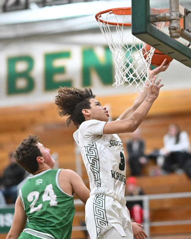 Steven Reynolds III takes the ball to the hoop 