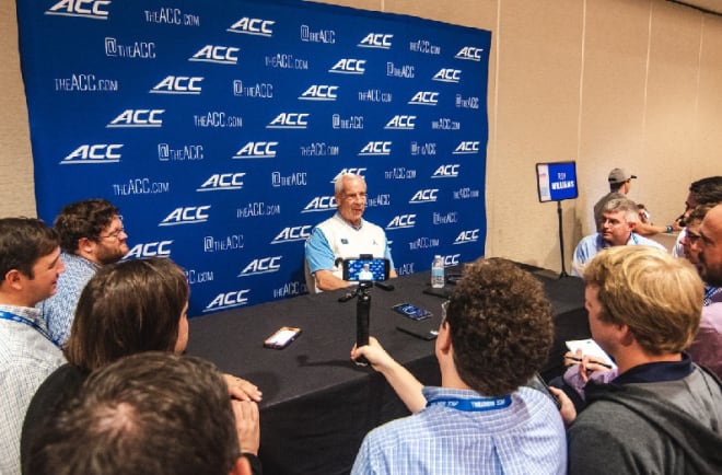 Roy Williams, Brandon Robinson and Garrison Brooks takes questions from the media during their breakout sessions Tuesday. 
