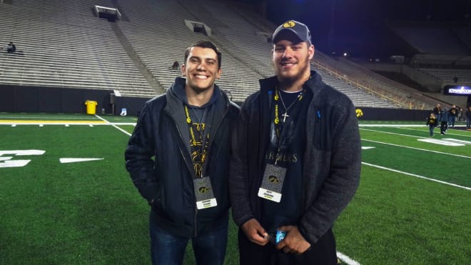 Samson Evans with fellow future Hawkeye Jeff Jenkins at Iowa's spring game in April.
