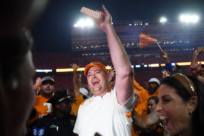 Tennessee head football coach Josh Heupel holds a box of cigars over his head after defeating Alabama in Neyland Stadium, Saturday, Oct. 15, 2022.