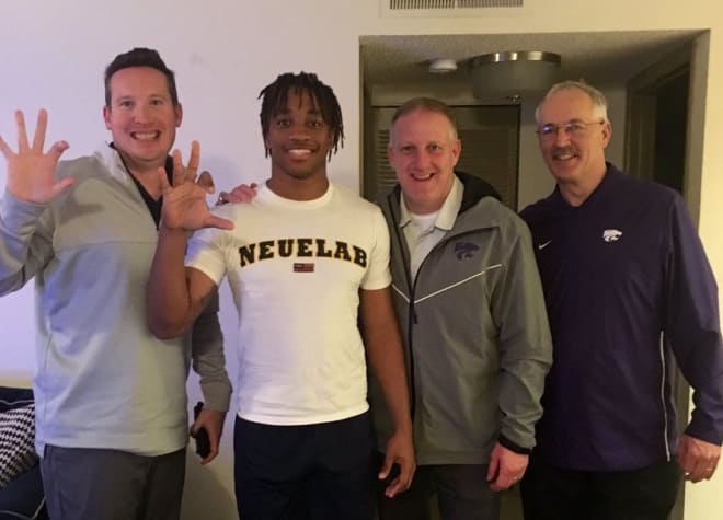 Youngblood with Kansas State coaches Taylor Braet, Chris Klieman and Courtney Messingham
