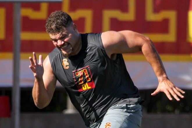 Former USC offensive lineman Liam Jimmons runs the 40-yard dash for NFL scouts Wednesday.