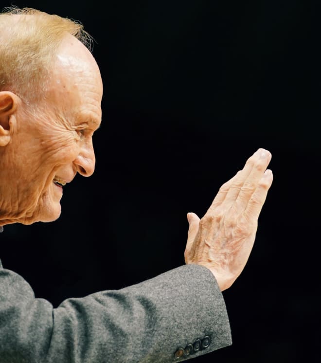 Former LSU head basketball coach Dale Brown acknowledges the crowd at Tuesday night's LSU-Kentucky game when the PMAC court was officially named in Brown's honor