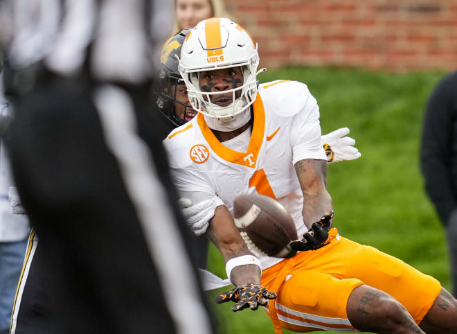 Nov 11, 2023; Columbia, Missouri, USA; Tennessee Volunteers wide receiver Dont'e Thornton Jr. (1) catches a touchdown pass against the Missouri Tigers during the first half at Faurot Field at Memorial Stadium.