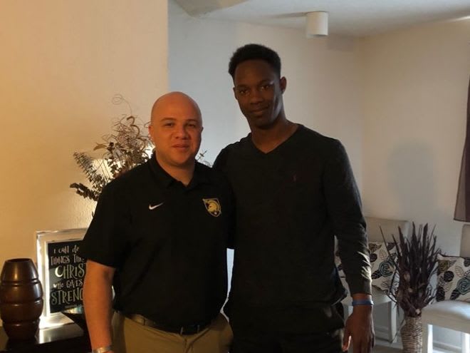 Army CB Coach Josh Christian-Young with DE recruit Jalen Williams during home visit