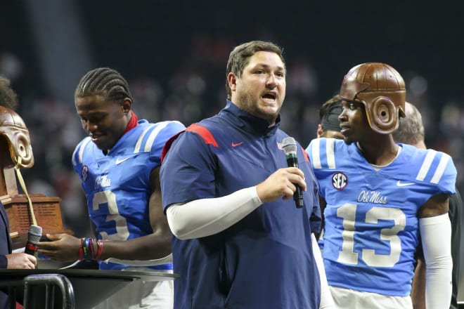 Ole Miss Rebels offensive coordinator Jeff Lebby talks to the crowd after a victory against the Louisville Cardinals in the Chick-fil-A Kickoff Game at Mercedes-Benz Stadium. Mandatory Credit: Brett Davis-USA TODAY Sports