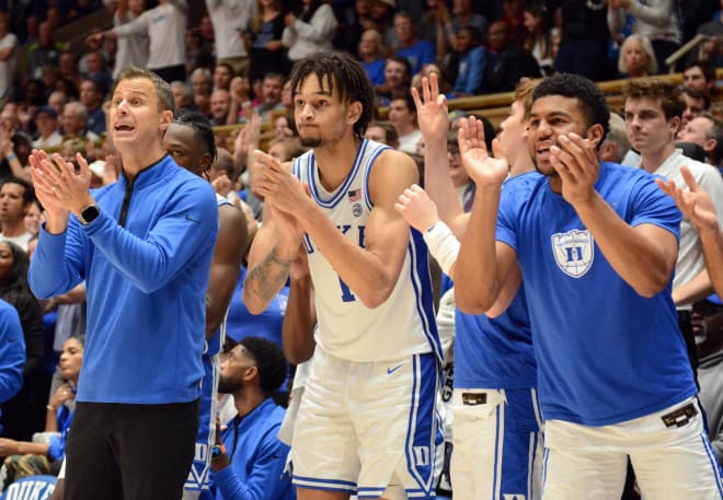 Jon Scheyer, left, and his Duke team are on the verge of the first extended break of the season. 