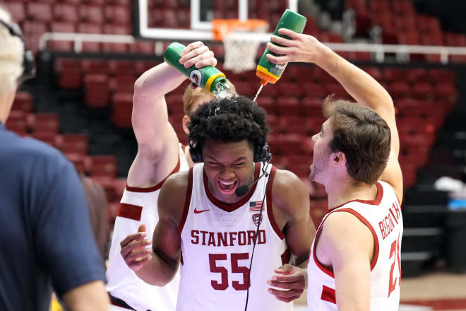 Harrison Ingram celebrates before getting interviewed by Bill Walton. 