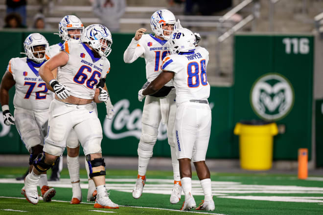 Oct 30, 2021; Fort Collins, Colorado, USA; Boise State Broncos tight end Tyneil Hopper (88) celebrates his touchdown with quarterback Hank Bachmeier (19) and offensive lineman Ben Dooley (66) in the fourth quarter against the Colorado State Rams at Sonny Lubrick Field at Canvas Stadium. Mandatory Credit: Isaiah J. Downing-USA TODAY Sports
