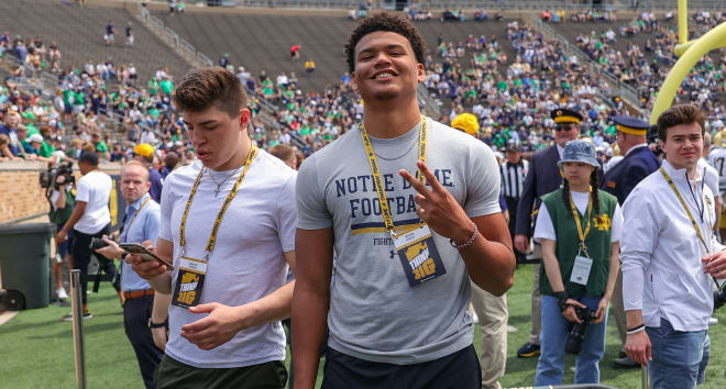 Drayk Bowen and Keon Keeley, two members of the burgeoning Notre Dame 2023 recruiting class, take in the Blue-Gold Game on April 23.