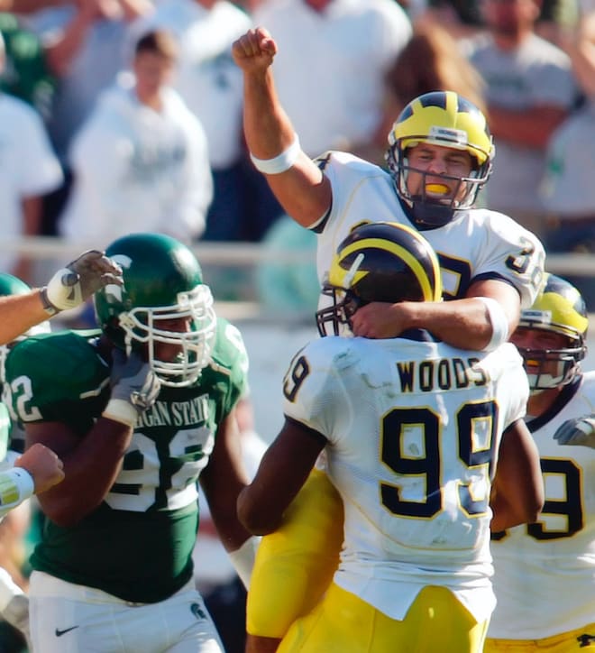 The Michigan Wolverines' football team picked up a 34-31 overtime win at No. 11 Michigan State in 2005 on Garrett Rivas' walk-off field goal.