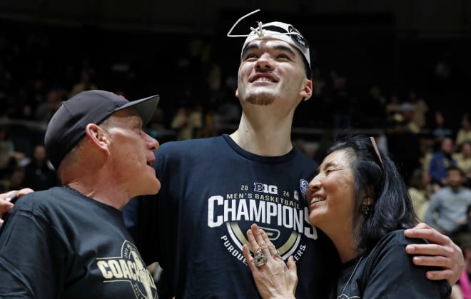 Zach Edey hugs Julia Edey and a man during the NCAA men s basketball game, Saturday, March 2, 2024, at Mackey Arena in West Lafayette, Ind. Purdue Boilermakers 80-74.