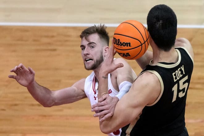 Purdue center Zach Edey (15) out rebounds Wisconsin forward Tyler Wahl (5) during the first half
