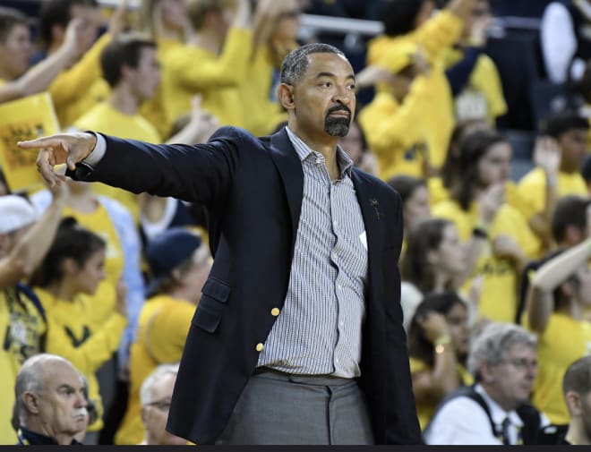 Michigan Wolverines basketball coach Juwan Howard and his second team hope to start play in November.