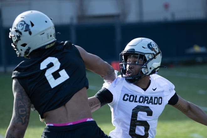 Junior cornerback Mekhi Blackmon (6) defends freshman wide receiver Brenden Rice (2) during practice last fall