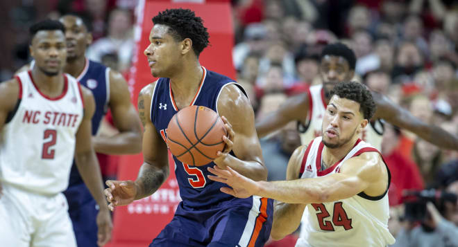 NC State redshirt sophomore wing Devon Daniels (No. 24) had 15 second-half points in the Wolfpack's 78-71 win over Auburn on Wednesday in Raleigh.