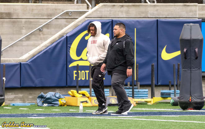 Running back commit Anthony League walks with Cal recruiting director Benji Palu on a spring unofficial visit with the Bears.