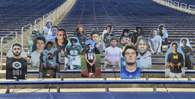 Michigan Wolverines football commits have their own cardboard cutouts at The Big House.