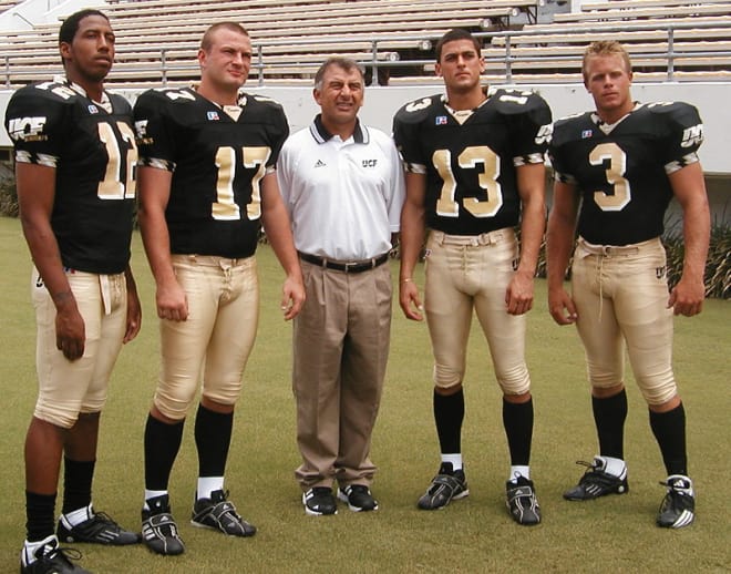 UCF's quarterbacks in 2003: Brandon Sumner (12), Ryan Schneider (17), Jon Rivera (13) and Gerry Connell (3) with QB coach Dr. Jamie Barresi