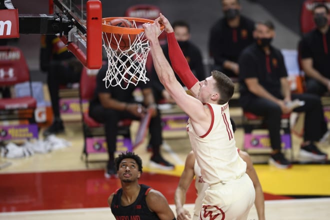 Micah Potter throws down two of his game-high 23 points in Wisconsin's 61-55 win over Maryland.