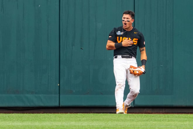 Jun 16, 2024; Omaha, NE, USA; Tennessee Volunteers center fielder Hunter Ensley (9) reacts after getting an out against the North Carolina Tar Heels during the second inning at Charles Schwab Field Omaha. Mandatory Credit: Dylan Widger-USA TODAY Sports