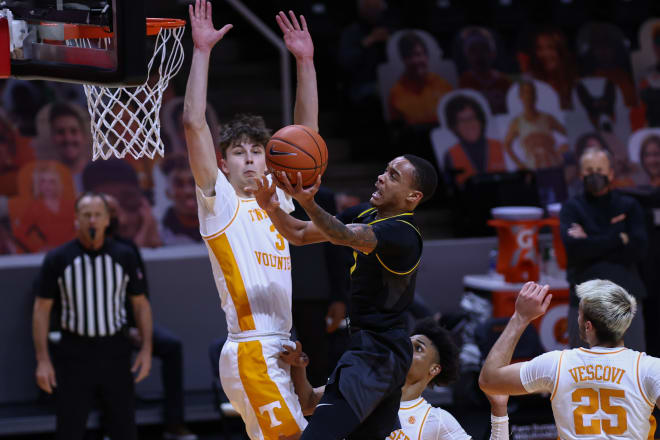 Xavier Pinson scored a game-high 27 points, including 19 of Missouri's first 32, and the Tigers led for all but 35 seconds for a win over No. 6 Tennessee.