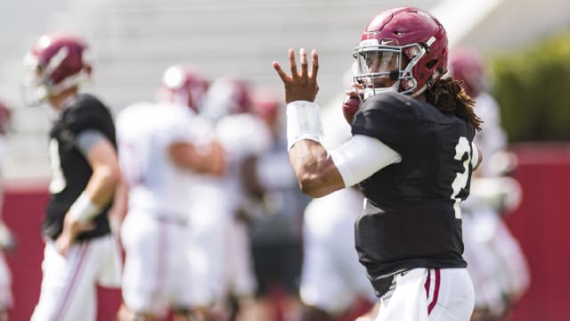 Alabama quarterback Jalen Hurts throws a pass before the Crimson Tide's second scrimmage this spring. Photo | Laura Chramer 