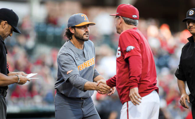 Tennessee's Tony Vitello and Arkansas' Dave Van Horn shake hands at home plate prior to a regular season matchup in 2023.