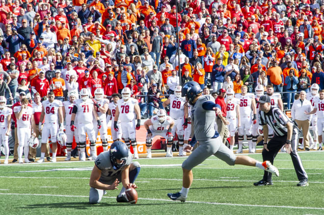 Illinois Fighting Illini place kicker James McCourt (17) kicks the game winning field goal during the second half against the Wisconsin Badgers at Memorial Stadium