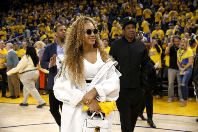 Beyoncé leaves the court at the end of the Golden State Warriors and New Orleans Pelicans game, in game one of the second round of the 2018 NBA Playoffs at Oracle Arena.