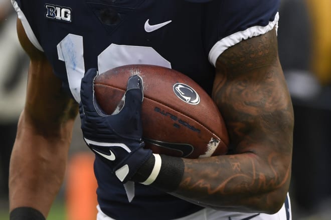 The Penn State football logo as seen on a ball carried by a Nittany Lion during Saturday's 20-18 loss to Illinois. AP photo