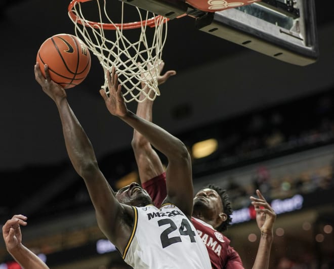 Missouri Tigers forward Kobe Brown (24) shoots as Alabama Crimson Tide guard Jaden Shackelford (5) defends during the first half at Mizzou Arena. Photo | Denny Medley-USA TODAY Sports