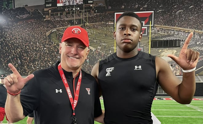 Houston (TX) St. Thomas defensive end Michael-Anthony Okwura with Texas Tech head coach Joey McGuire