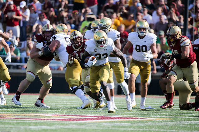 Josh Adams (above) and Brandon Wimbush both rushed for 218 yards at Boston College and passed the 2,000-yard mark in his career.
