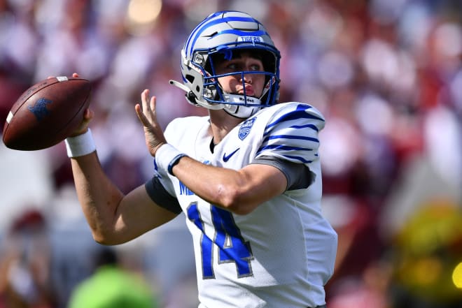 Oct 2, 2021; Philadelphia, Pennsylvania, USA; Memphis Tigers quarterback Seth Henigan (14) throws a pass in the first half against the Temple Owls at Lincoln Financial Field.