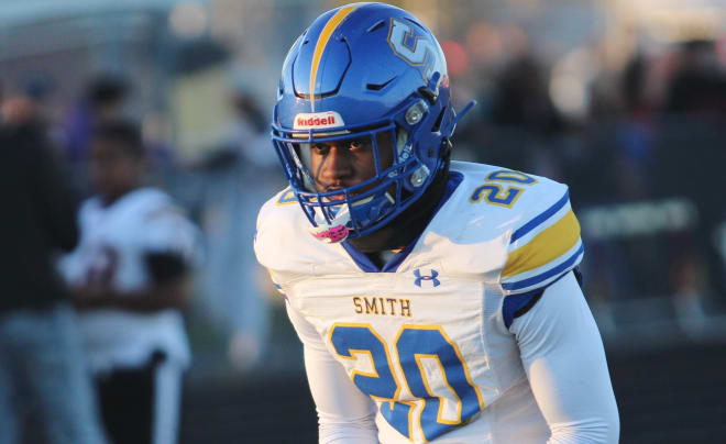Oscar Smith's Damon Etheridge intercepted three passes to bring his season count to eight as the Tigers scored the final 35 points to hand King's Fork its first loss of the season, 52-21 in Suffolk, on October 14, 2022