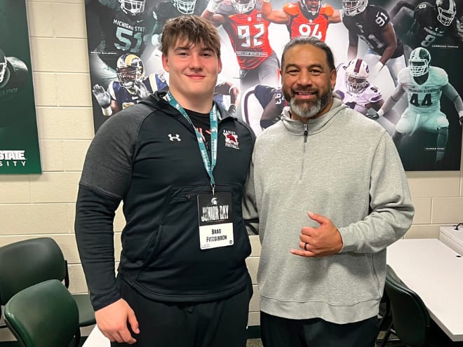 Class of 2025 three-star defensive lineman Brad Fitzgibbon with Michigan State defensive line coach Legi Suiaunoa on April 6, 2024. (Photo courtesy of Brad Fitzgibbon)