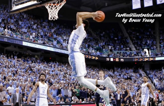 Justin Jackson rammed home this late dunk, but it was an all-inclusive performance by the Tar Heels on Sunday.