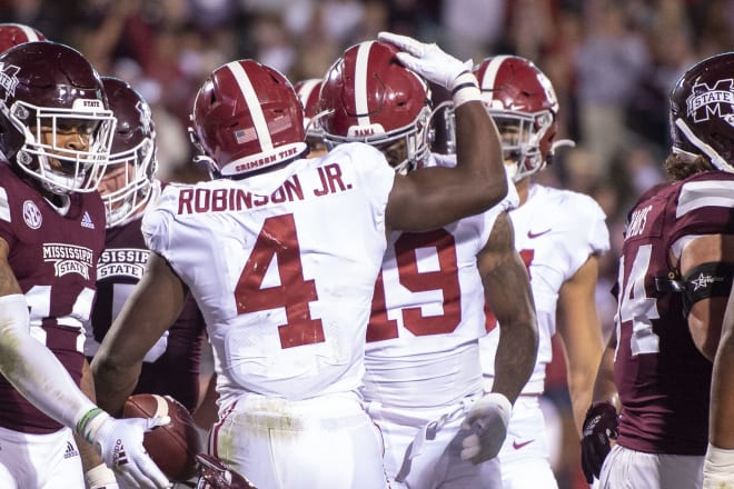 Alabama Crimson Tide running back Brian Robinson Jr. celebrates with tight end Jahleel Billingsley following a touchdown against Mississippi State