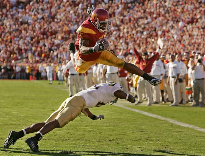 Former USC star Reggie Bush is now officially welcomed back to the program after a 10-year NCAA-mandated disassociation.