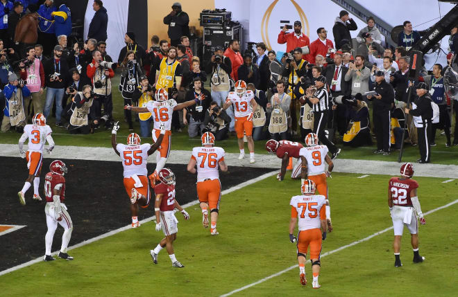 Clemson Tigers wide receiver Hunter Renfrow (13) celebrates with teammates after scoring a touchdown against the Alabama Crimson Tide in the fourth quarter in the 2017 College Football Playoff National Championship Game at Raymond James Stadium. Mandatory Credit: Jasen Vinlove-USA TODAY Sports.